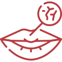 Red outline icon of lips with a magnifying glass showing dry, cracked skin.